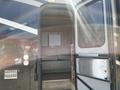 A 2008 Newmar Canyon Star 36 Foot Class A Motorhome with an open door revealing the interior seating area