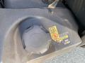 Close-up of the fuel cap on a Kubota RTV-X 1100 C with caution labels indicating diesel fuel requirements and a warning not to step on the surface