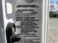 A label detailing specifications and manufacturing information for a 2016 Isuzu NQR vehicle
