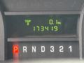 Dashboard display of a 2014 Ford E-350 showing trip mileage of 0.1 miles and total mileage of 173419 with indicators for gear position P R N D 3 2 1