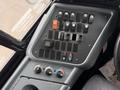 A dashboard panel of a 2016 International CE300 featuring various switches buttons and controls arranged systematically