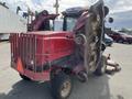 A red 2014 Toro Groundmaster 5910 turf maintenance vehicle with a large mowing deck and off-set cutting blades