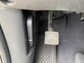 Close-up of the foot pedal in a 2015 Kia Sorento labeled PUSH ON OFF