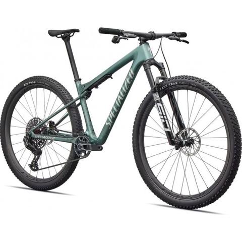 A 2026 Specialized Epic World Cup Pro mountain bike featuring a green frame a lightweight design and large knobby tires for off-road performance