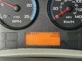 Dashboard of a 2016 International 7600 showing RPM and speed gauges along with a digital display indicating hours and a code