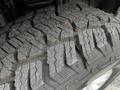 Close-up of a durable tire tread from a 2020 Ford F-350 SD showcasing deep grooves and rugged patterns designed for traction