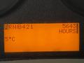 Display screen showing operational data with reading of BRN@421 and total hours recorded as 5643 with a temperature of 50C