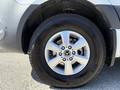 A close-up view of a silver alloy wheel on a 2023 Mercedes-Benz Sprinter showcasing the tire and wheel design