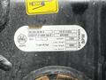 A Pottinger Impress 2020 machine with product specifications visible on a label including weight and operational details
