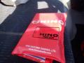 A red folder with the Hino logo and text that reads Vancouver's Hino Truck Sales along with contact information for Hino Motors Canada Ltd