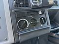 Control panel of a 1994 Volvo FE 42 featuring dials for air conditioning and ventilation with labeled settings for recycled air and freshness