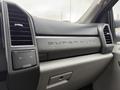 Interior dashboard of a 2021 Ford F-550 with the embossed text "SUPER DUTY" visible on the console