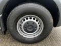 Close-up of a 2021 Mercedes-Benz Sprinter wheel featuring a gray steel rim and a Michelin tire
