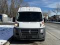 A 2017 RAM Promaster van facing forward with a white exterior and a black lower front grille