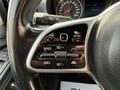 2019 Mercedes-Benz Sprinter steering wheel controls featuring buttons for cruise control functions including set resume and cancel