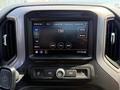 A touchscreen display showing radio settings and options in a 2021 Chevrolet Silverado 1500