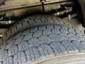 Close-up of a tire from a 2006 Emergency One Fire Truck showcasing its detailed tread pattern and robust design