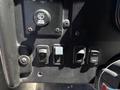 Close-up of the control panel in a 2019 Freightliner MT45 featuring switches for wiper washer panel lights cruise and rear fog lights