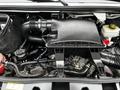 The image shows the engine compartment of a 2020 Mercedes-Benz Sprinter with various components including the air filter housing and engine parts visible