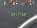A digital odometer display showing the mileage of 88275.3 on a vehicle dashboard