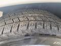 Close-up view of a tire from a 2017 Mercedes-Benz Sprinter showing detailed tread patterns and visible debris on the surface