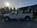 White 2008 Ford F-150 XL pickup truck parked with a standard cab and a long bed