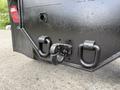 A black towing hitch with two D-rings attached to the rear of a 2017 Ford F-750 truck