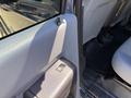 A 2014 Ford F-250 SD with a focus on the interior door handle and armrest area