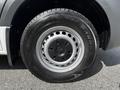 Close-up of a silver wheel and tire from a 2020 Mercedes-Benz Sprinter showcasing the tire tread and wheel design