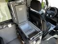 A 2017 Mercedes-Benz Sprinter with an open cooler located in the front passenger area next to the driver's seat