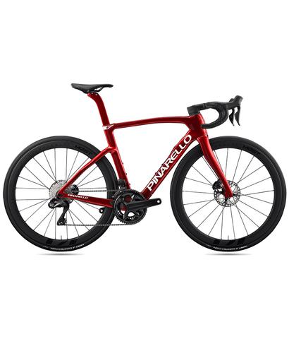 A red 2026 Pinarello F7 Ultegra Di2 road bike featuring a sleek frame, disc brakes, and aerodynamic design with black wheels and handlebars