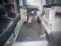 Interior view of a 2008 Freightliner MT45 Chassis showing a driver seat and metal floor without any cargo or additional objects visible