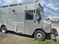A 2007 Morgan Olson Workhorse W42 with a metallic exterior featuring large side doors and a utility-style design