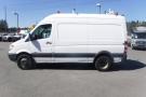 A white 2012 Mercedes-Benz Sprinter van with a high roof and no side windows