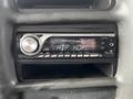 A JVC car stereo featuring a digital display with text reading HIP HOP