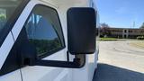 A 2011 Chevrolet Express van featuring a side rearview mirror showing a black casing and attached to the driver's side door