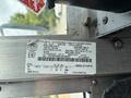 A 2018 Ford Econoline vehicle identification plate with details including VIN number weight ratings and manufacturer information