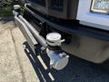 A 2019 Ford F-750 with a silver valve attached to its front bumper