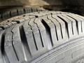 Close-up of a tire with visible tread patterns from a 2018 Chevrolet Express showing wear and texture on the rubber surface