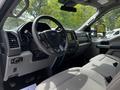 Interior view of a 2020 Ford F-350 Super Duty showing the steering wheel dashboard and seats