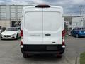 White 2022 Ford Transit van with a sliding door and a rear-view exterior design