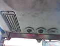 Interior view of a Toro Grounds Master 5910 showing the ceiling with ventilation grilles and three circular air vents