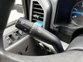 Close-up of a 2020 Ford F-350 steering wheel control stalk featuring turn signal and windshield wiper controls