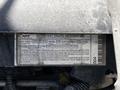 Engine information label of a 2013 Mitsubishi Fuso FE160 detailing the engine family model and emission control system