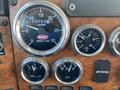 Dashboard of a 2008 Peterbilt 340 showing gauges for hours RPM oil pressure and volts