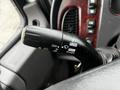 Close-up of a 2018 Freightliner M2 106 turn signal lever featuring controls for headlights and fog lights with labeled settings