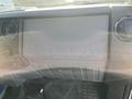 2015 Ford F-450 SD dashboard featuring the embossed text Super Duty with air conditioning controls and stereo speakers