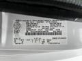 A 2013 Ford Econoline vehicle identification label displaying vehicle specifications and manufacturing details