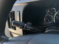 A close-up of the control stalk in a 2020 Chevrolet Express used for operating lights and windshield wipers