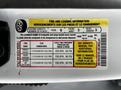A 2020 Ford F-350 tire and loading information label displaying seating capacity and recommended cold tire pressures for front and rear tires